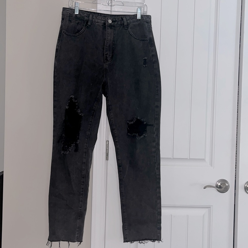 Women’s black ripped jeans